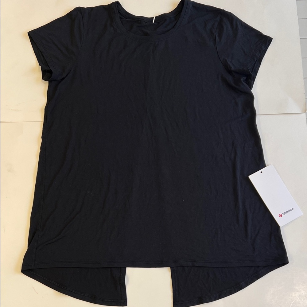 Lululemon Black Women's Top in size medium